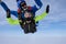Tandem skydiving. Tandem jump in the sky.