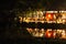 Tangerang, Indonesia: December 14th 2022, Night photography of the restaurant with beautiful reflection from the lake