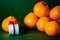 Tangerine and Christmas toy on a beautiful background. beautiful Christmas wallpaper. high-quality background is born. Copy space