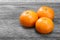 Tangerine, Mandarin honey orange on wood