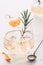 Tangerine and Rosemary Old Fashioned, drink, close-up, white marble background