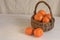 Tangerines in basket on right, room for text