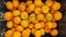 Tangerines in a box, harvest of tangerines, citrus fruits top view