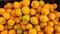 Tangerines in a box, harvest of tangerines, citrus fruits top view