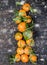 Tangerines clementine with leaves on a wooden table.