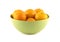 Tangerines in green china bowl isolated