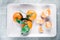 Tangerines, mandarines, clementines, citrus fruits with leaves on plate, flatlay - rustic, vintage and healthy eating concept