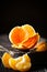 Tangerines on an old fashioned country table. Selective focus. Vertical.