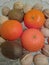 tangerines, walnuts and kiwis close - up as background