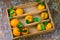 tangerines in a wooden box