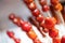 Tanghulu traditional Chinese hard caramel coated strawberry skewers close-up