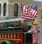 Tangier Shrine Clown in jalopy in parade in small town America