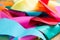 Tangled, crumpled colourful bunting, background