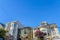 Tangled electrical wires against the row of houses in San Francisco, CA