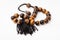 Tangled worry beads from tiger`s eye gemstones