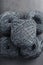 Tangles of gray yarn made of natural wool close-up