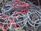 tangles of used electrical cables in the landfill to be recycled