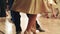 Tango dancers feet while dancing close-up