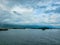 Tanguar Haor Houseboat sailing on the river near the India border in Bangladesh during the rainy season with the beautiful