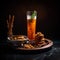 Tangy and spicy Neer Mor in a tall glass with savory snacks on table