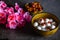 Tangyuan, peanuts, dates, Wolfberry and flowers on the table