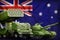 Tank and missile launcher with summer pixel camouflage on the Australia flag background. Australia heavy military armored vehicles