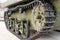 Tank tracks. Tank of the Second World War. Track armor close-up. Black track link and large rubberized rollers. Tank chassis. The