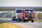 Tank Truck Being Towed by a Heavy Duty Tow Truck