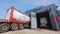 Tank and truck cleaning. A tanker truck drives into a tank cleaning station. Truck wash. Station for cleaning trucks and