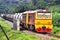 Tanker-freight train passes the bridge