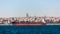 The tanker ship crosses the Bosporus on the background of Uskudar
