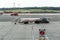 Tanker truck with aviation fuel at the runway of the airport