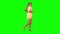 Tanned blond woman is running with smile on green screen. Profile view.