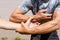 Tanned man confronts a man with pale skin. Close-up of hands