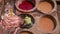 Tanner working in the dye pots at Chouara Tannery painting animal leathers, Fez, Morocco