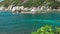 Tanote Bay on sunny day. Rippled ocean water over beautiffull Coral Reef. Divers practice in the blue bay. Koh Tao