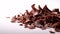 Tantalizing Macro Shot of Chocolate Shavings Unfurling from Block on White Background