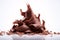 Tantalizing Macro Shot of Chocolate Shavings Unfurling from Block on White Background