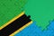 Tanzania flag is depicted on a completed jigsaw puzzle with free green copy space on the right side