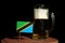 Tanzanian flag with beer mug on black