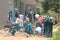 Tanzanian public high school students work in the school yard