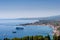 Taormina Bay in a summer day seen from greek theater in Taormin