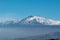 Taormina - Panoramic view of snow capped Mount Etna volcano from Taormina, Sicily, Italy, Europe, EU