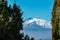 Taormina - Panoramic view of snow capped Mount Etna volcano from Taormina, Sicily, Italy, Europe, EU