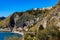 Taormina shore with Castello Saraceno castle, Giardini Naxos and Villagonia towns in Messina region of Sicily in Italy