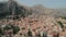 Taormina, Sicily, Italy - August 2019: Ancient city on the plain in the mountains. Aerial drone shot