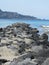 TAORMINA, SICILY, ITALY - Jul 06, 2011: A rock pier or dock for shelter and docking of small boats near Taormina