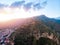 Taormina, Sicily Italy sunset, volcano Etna in clouds. Aerial top view, drone photo