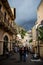 Taormina street bustling with tourists, tourist shops and restaurants