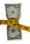 Tape measure around dollar